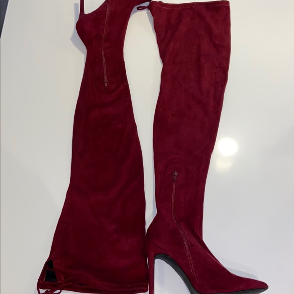 Over the knee high heeled boots